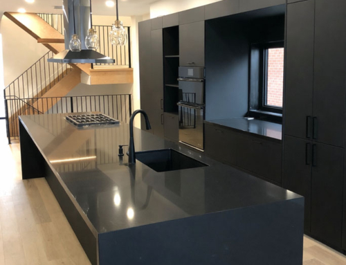 Black waterfall island kitchen renovation | Birchmount Interior Solutions